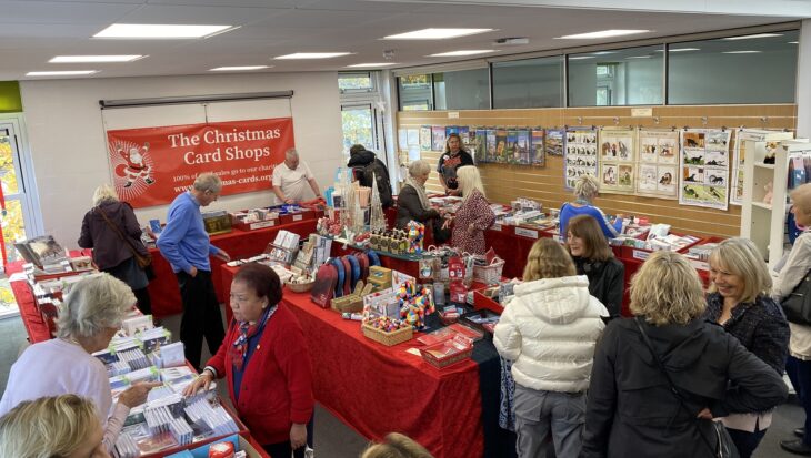 Customers browse in a Christmas card shop