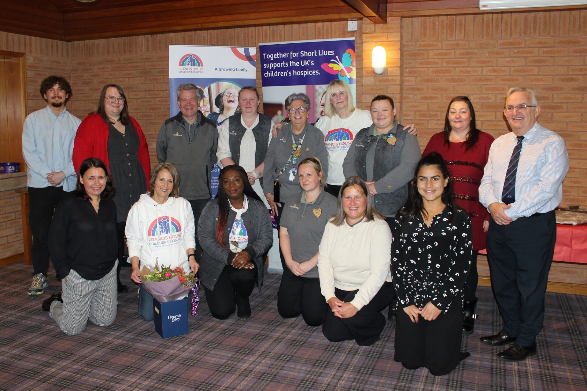 Morrisons colleagues and staff from Francis House in the hall